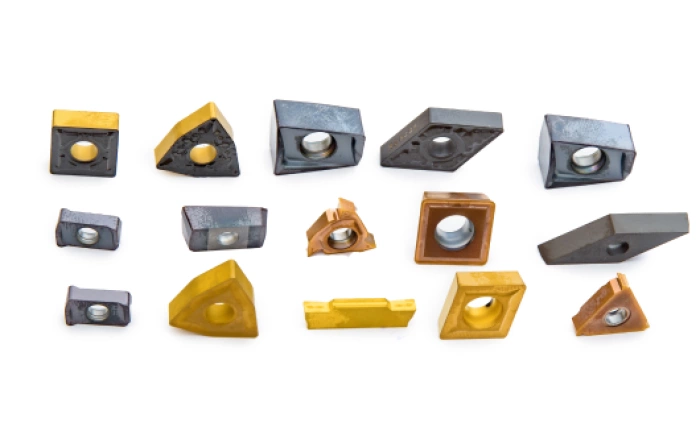 Replaceable carbide inserts